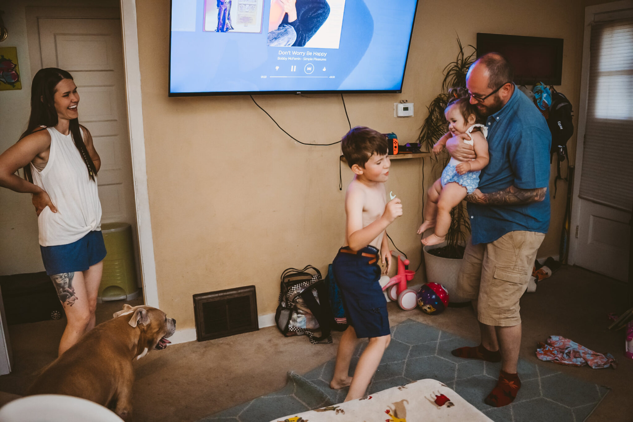 family has dance party in living room